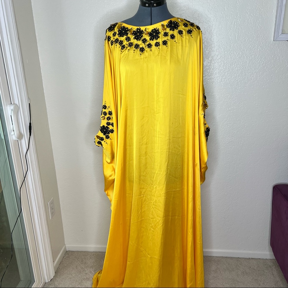 Yellow silk dress with embellishments